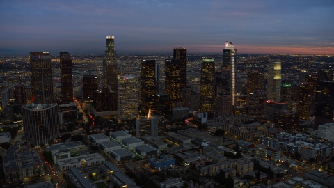 A view of skyscrapers at twilight in Downtown Los Angeles, California Aerial Stock Photos | AX0158_052.0000310