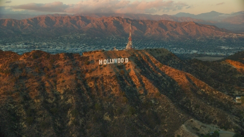 AX0162_102.0000000 - Aerial stock photo of The famous Hollywood Sign at twilight in Los Angeles, California