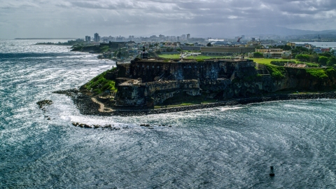 AX101_014.0000165F - Aerial stock photo of Coastal historic fort in Old San Juan, Puerto Rico