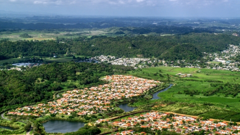 Rural neighborhoods near forests, Dorado, Puerto Rico Day  Aerial Stock Photos | AX101_034.0000000F