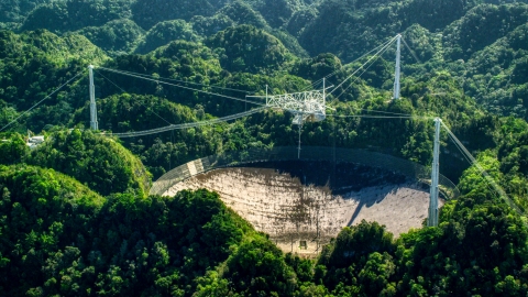 Arecibo Observatory in lush green Karst forest, Puerto Rico  Aerial Stock Photos | AX101_096.0000000F