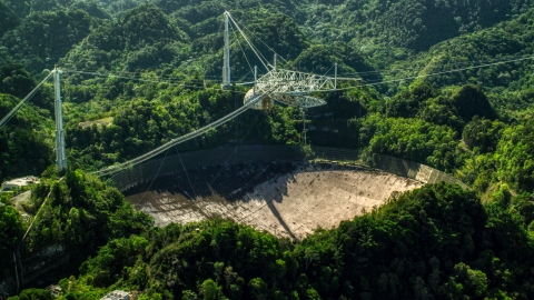 Arecibo Observatory surrounded by Karst Forest trees in Puerto Rico  Aerial Stock Photos | AX101_106.0000000F