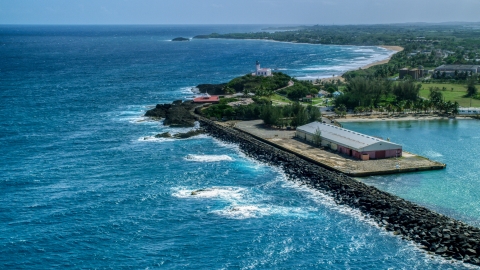 AX101_142.0000000F - Aerial stock photo of Arecibo Lighthouse and the blue waters of the Caribbean, Puerto Rico 