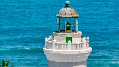 AX102_070.0000071F - Aerial stock photo of The top of Cape San Juan Light with views of clear blue waters, Puerto Rico