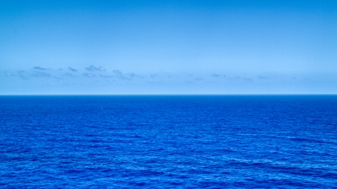 AX102_092.0000000F - Aerial stock photo of Sapphire blue waters of the Atlantic Ocean 