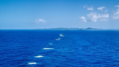 Tiny islands in sapphire blue ocean waters near Culebra, Puerto Rico Aerial Stock Photos | AX102_098.0000000F