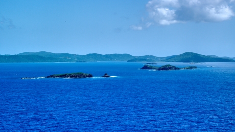 Cluster of small islands in sapphire blue waters near the Caribbean island of Culebra, Puerto Rico  Aerial Stock Photos | AX102_101.0000000F