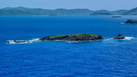 Small Caribbean island in sapphire blue waters near Culebra, Puerto Rico  Aerial Stock Photos | AX102_102.0000000F