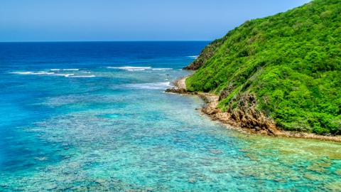 Reefs in sapphire blue waters and a rugged coastline, Culebra, Puerto Rico  Aerial Stock Photos | AX102_114.0000000F