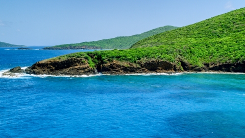 Sapphire blue waters and a rugged island coastline, Culebra, Puerto Rico  Aerial Stock Photos | AX102_115.0000000F