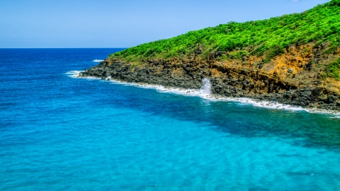 Sapphire blue waters on the rocky coast of Culebra, Puerto Rico Aerial Stock Photos | AX102_119.0000000F