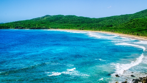 AX102_120.0000121F - Aerial stock photo of Sapphire blue waters and a deserted Caribbean beach in Culebra, Puerto Rico 