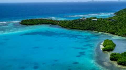 Oceanfront home on the Caribbean island coast of Culebra, Puerto Rico  Aerial Stock Photos | AX102_136.0000337F