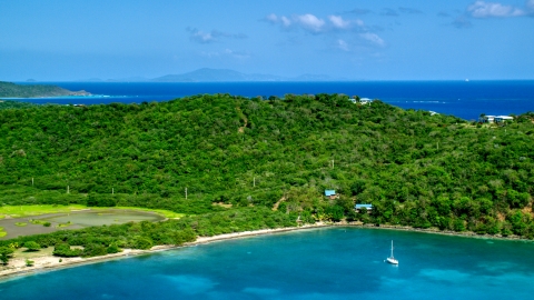 AX102_170.0000000F - Aerial stock photo of A view of hilltop and oceanfront homes in Culebra, Puerto Rico