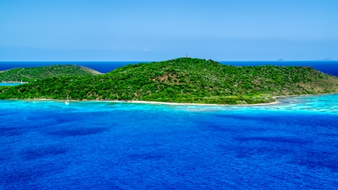 AX102_174.0000000F - Aerial stock photo of Sapphire blue waters and a small Caribbean island, Culebrita, Puerto Rico 