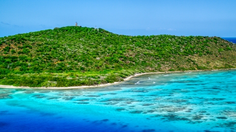 AX102_174.0000288F - Aerial stock photo of Sapphire blue waters and a Caribbean island shore, Culebrita, Puerto Rico 