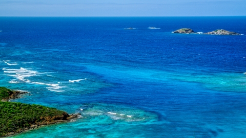 Tiny islands in sapphire blue ocean in the Caribbean, Culebrita, Puerto Rico  Aerial Stock Photos | AX102_179.0000133F