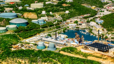 AX102_198.0000000F - Aerial stock photo of Waterfront desalinization plant in Charlotte Amalie, St. Thomas, US Virgin Islands 