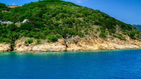 AX102_201.0000234F - Aerial stock photo of A tropical island coast in sapphire waters, Charlotte Amalie, St. Thomas