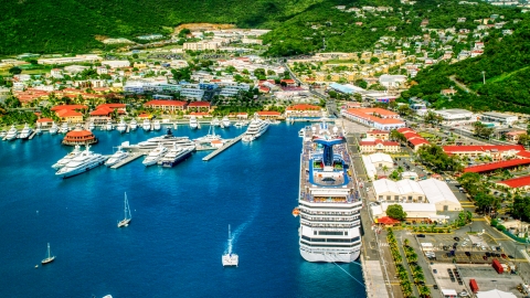 Cruise ship and yachts docked in sapphire waters at a Caribbean island town, Charlotte Amalie, St. Thomas  Aerial Stock Photos | AX102_210.0000000F