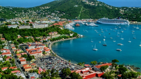 Sailboats and cruise ship in the harbor beside a Caribbean island town, Charlotte Amalie, St Thomas  Aerial Stock Photos | AX102_224.0000000F