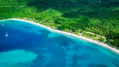 White sand Caribbean island beach and turquoise blue waters, Magens Bay, St Thomas  Aerial Stock Photos | AX102_270.0000000F