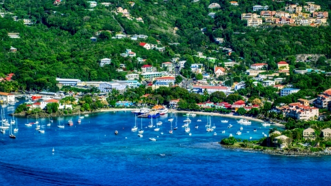 A coastal town and boats in the harbor with Caribbean blue waters, Cruz Bay, St John Aerial Stock Photos | AX103_018.0000094F