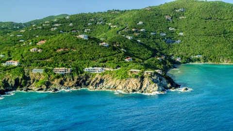 Hillside mansions overlooking Caribbean blue waters, Cruz Bay, St John Aerial Stock Photos | AX103_037.0000000F