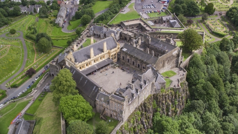 AX109_025.0000198F - Aerial stock photo of A view of the grounds of iconic Stirling Castle, Scotland