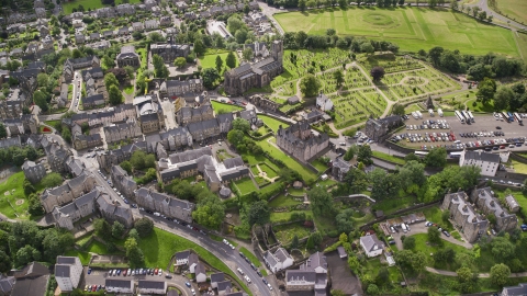 A church and cemetery near residential area, Stirling, Scotland Aerial Stock Photos | AX109_027.0000087F