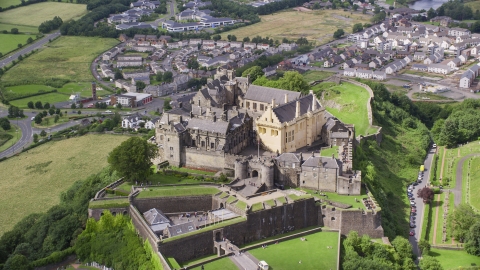 Historic Stirling Castle on a hill in Scotland Aerial Stock Photos | AX109_035.0000118F