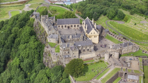 AX109_040.0000000F - Aerial stock photo of Historic Stirling Castle with tourists, Scotland