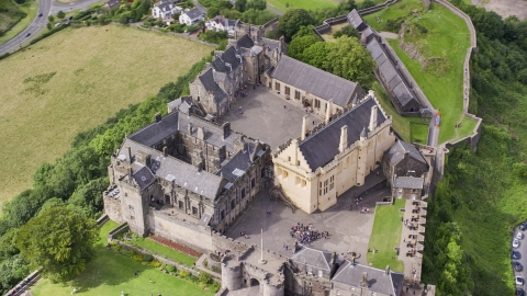 AX109_041.0000000F - Aerial stock photo of Iconic Stirling Castle and its grounds, Scotland