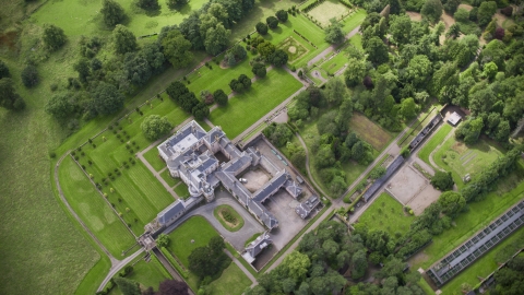 AX109_060.0000221F - Aerial stock photo of A bird's eye view of Keir House and estate grounds in Stirling, Scotland