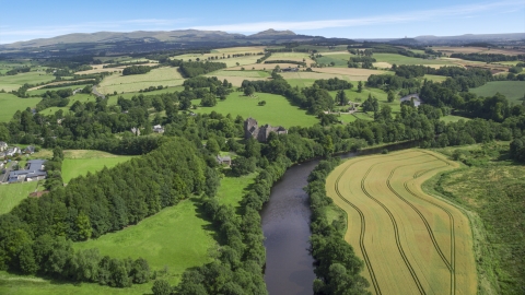 River Teith and historic Doune Castle near farmland, Scotland Aerial Stock Photos | AX109_087.0000000F