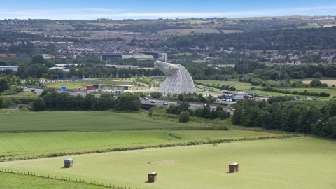 The Kelpies sculptures in Falkirk, Scotland Aerial Stock Photos | AX109_121.0000000F