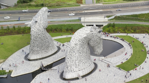 The iconic Kelpies sculptures in Falkirk, Scotland Aerial Stock Photos | AX109_127.0000070F