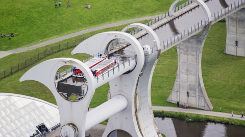 AX109_142.0000025F - Aerial stock photo of Ferries on the Falkirk Wheel boat lift in Scotland