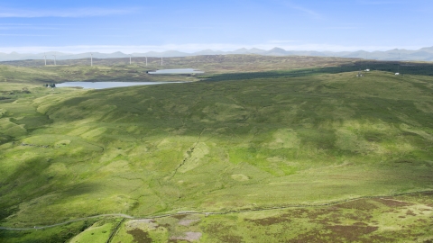 AX110_016.0000000F - Aerial stock photo of Earlsburn Reservoirs surrounded by green countryside, Scotland