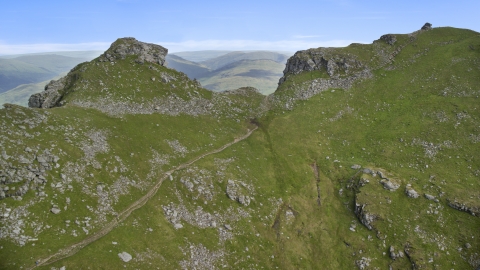 AX110_086.0000000F - Aerial stock photo of The green mountain peak, The Cobbler, in the Scottish Highlands, Scotland