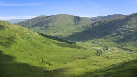 AX110_096.0000000F - Aerial stock photo of Beinn Dubh, a lush green mountain, Scottish Highlands, Scotland