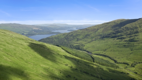 AX110_098.0000179F - Aerial stock photo of Beinn Dubh with Loch Lomond in the background, Scottish Highlands, Scotland