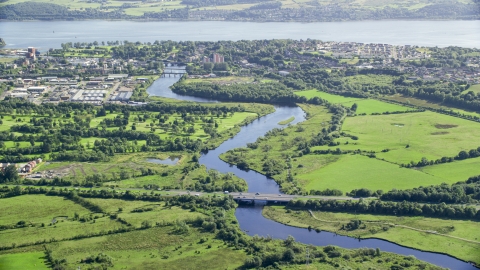 AX110_137.0000099F - Aerial stock photo of River Leven and waterfront town, Dumbarton, Scotland