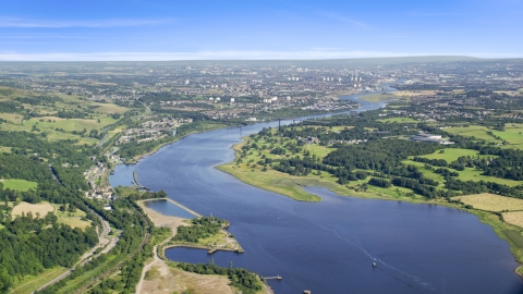 AX110_142.0000000F - Aerial stock photo of Erskine Bridge spanning River Clyde near Glasgow, Scotland