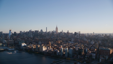 Midtown Manhattan seen from Chelsea at sunrise in New York City Aerial Stock Photos | AX118_158.0000100F