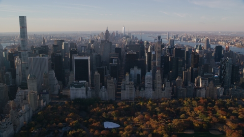 Midtown skyscrapers and Central Park in Autumn at sunrise in New York City Aerial Stock Photos | AX118_196.0000150F