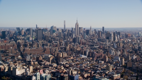 AX119_020.0000092F - Aerial stock photo of Skyscrapers in Midtown Manhattan, New York City