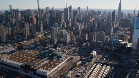 AX119_027.0000083F - Aerial stock photo of Convention Center and West Side Yard in Hell's Kitchen, Midtown, New York City