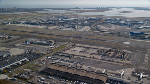 AX120_051.0000055F - Aerial stock photo of JKF International Airport in Autumn, Queens, New York City