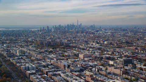 AX120_080.0000094F - Aerial stock photo of Lower Manhattan skyline seen from Brooklyn in Autumn, New York City